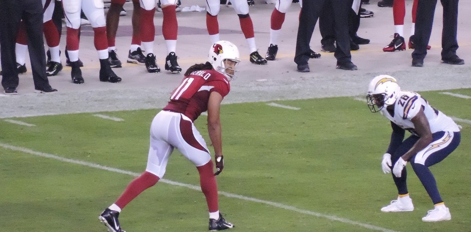 Larry_Fitzgerald_and_Brandon_Flowers_in_2014